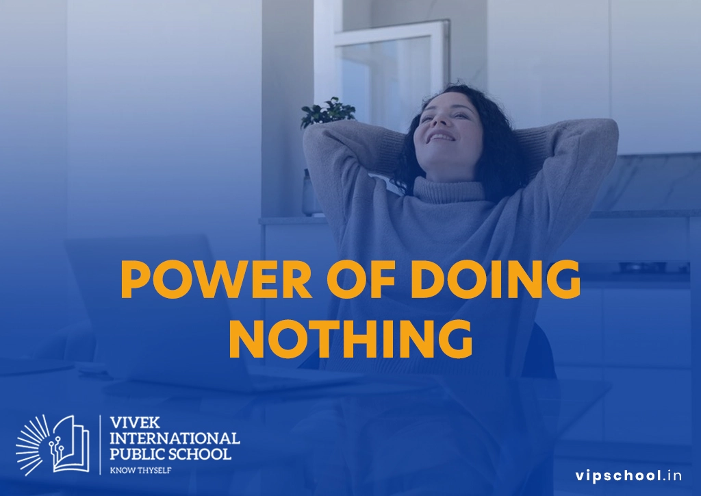 image of a smiling woman leaning back at her desk with a laptop, overlaid by bold orange text “POWER OF DOING NOTHING,” with the VIPS logo.